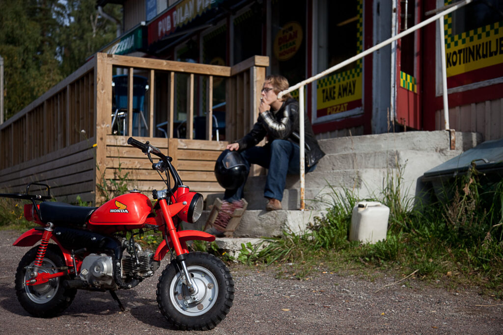 Honda Monkey by a kiosk